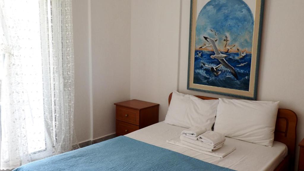 Postel nebo postele na pokoji v ubytování Agapi Apartments