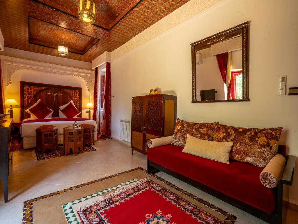Postel nebo postele na pokoji v ubytování Clé De Sol Riad & SPA
