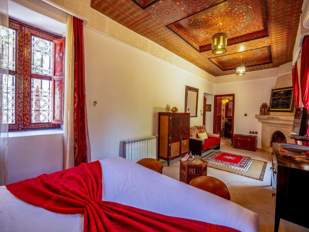Postel nebo postele na pokoji v ubytování Clé De Sol Riad & SPA