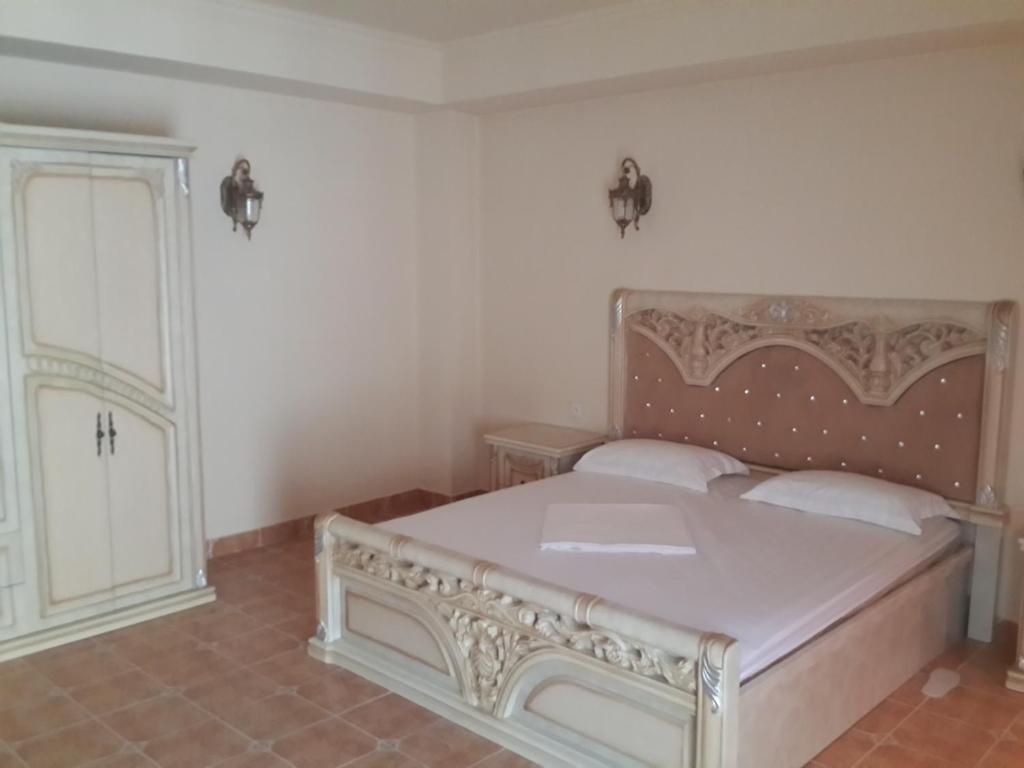 Postel nebo postele na pokoji v ubytování Venezia Palazzo Hotel