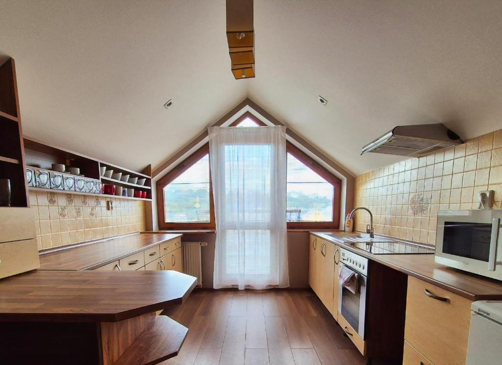 Kuchyň nebo kuchyňský kout v ubytování B&B Penzión Magura