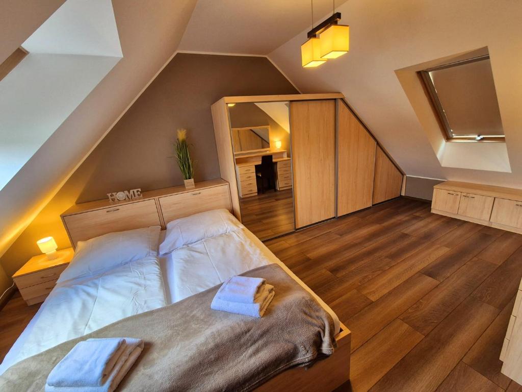 Postel nebo postele na pokoji v ubytování B&B Penzión Magura