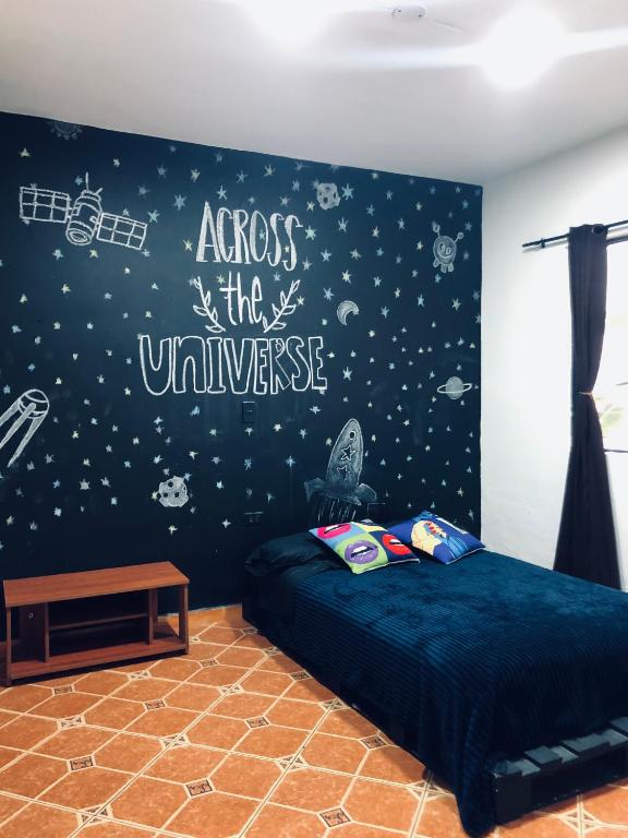 Postel nebo postele na pokoji v ubytování Casa Egos Pop Laureles