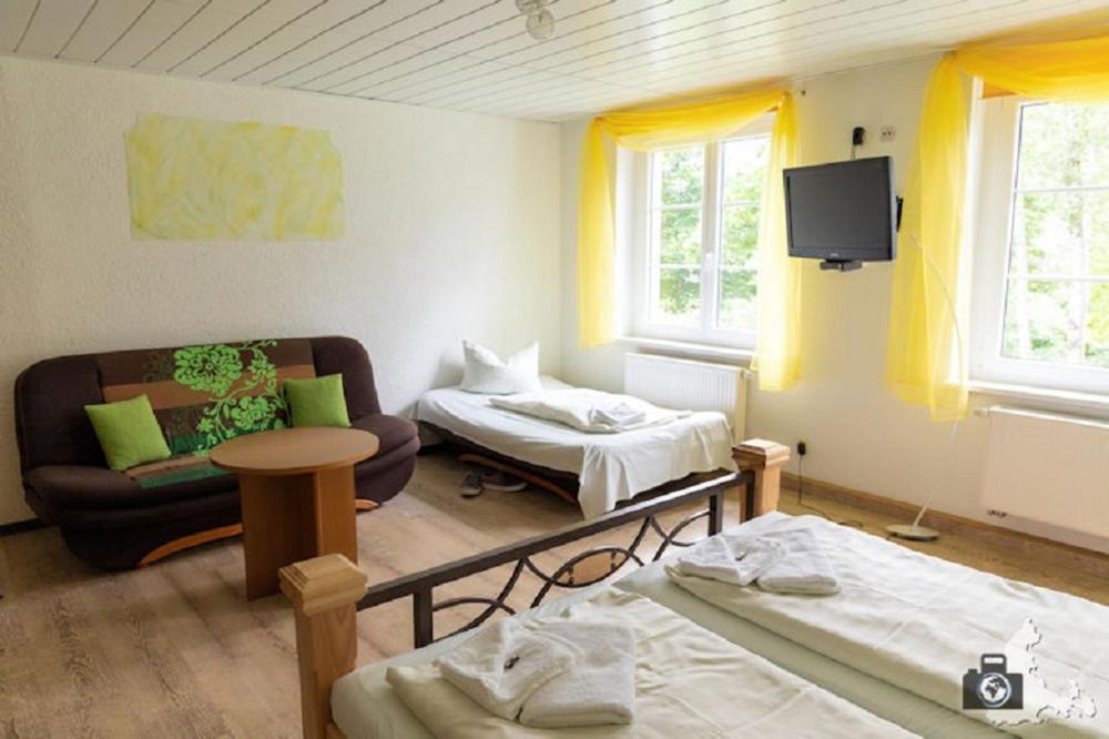 Postel nebo postele na pokoji v ubytování Kräuterbaude