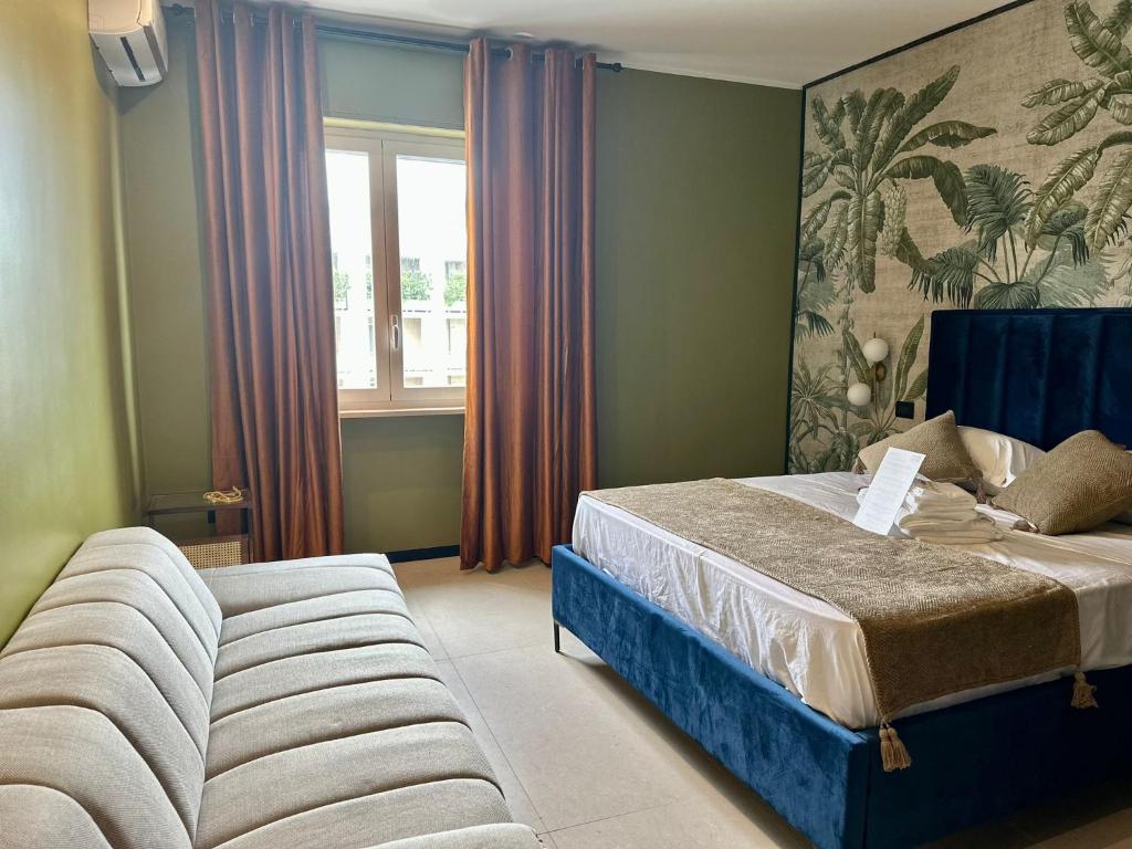 Postel nebo postele na pokoji v ubytování Mandarin Apulia 10 B&B