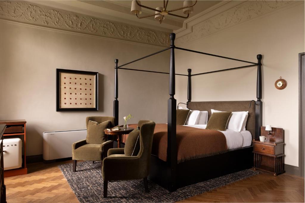 Postel nebo postele na pokoji v ubytování New Park Manor Hotel