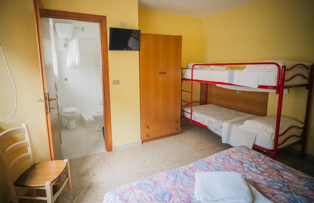 Postel nebo postele na pokoji v ubytování Fortezza