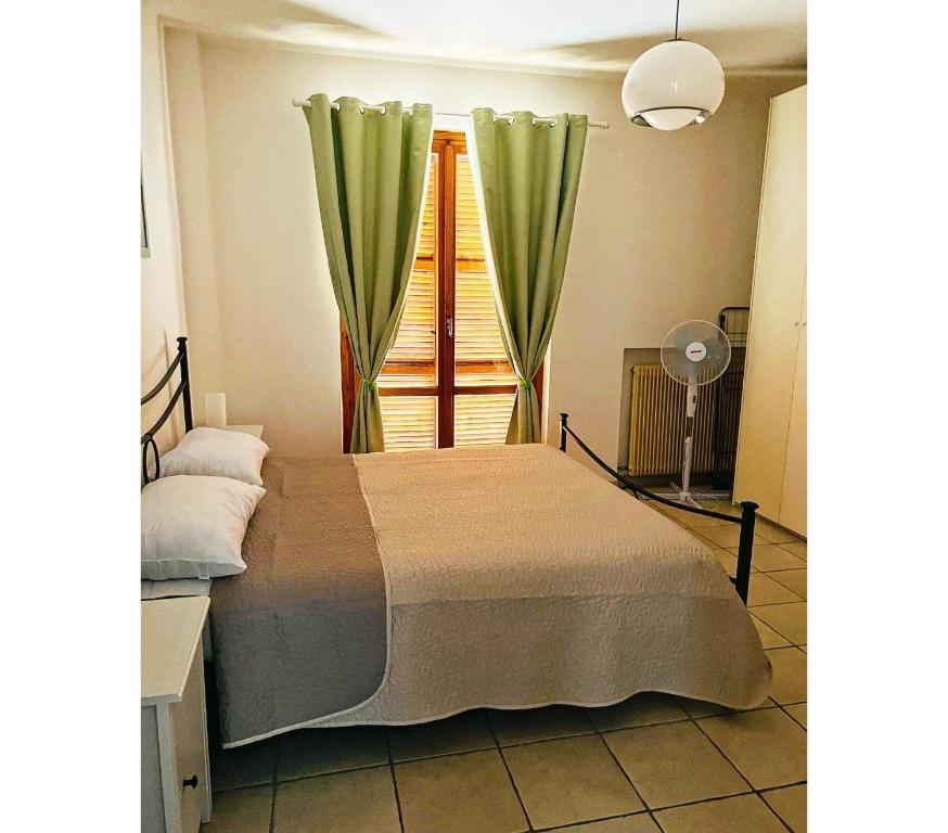 Łóżko lub łóżka w pokoju w obiekcie Italian Experience-Numana Suite Apartment