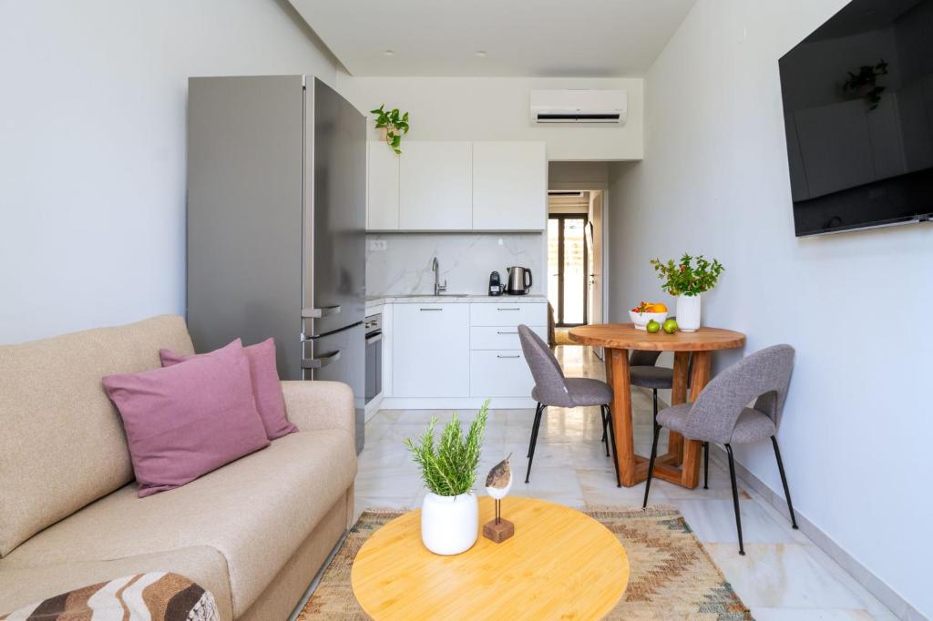TV a/nebo společenská místnost v ubytování Inia Apartments