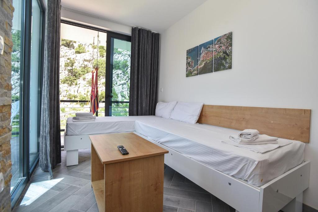 Postel nebo postele na pokoji v ubytování Apartments A Čanj