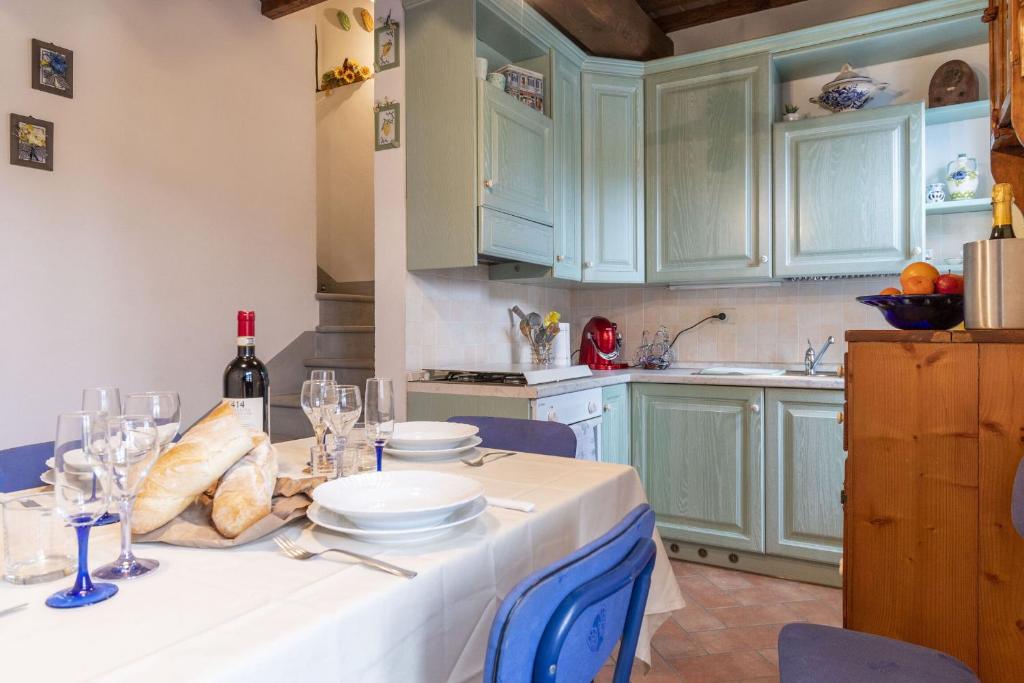 A kitchen or kitchenette at Italian Experience-Il Borgo Apartment
