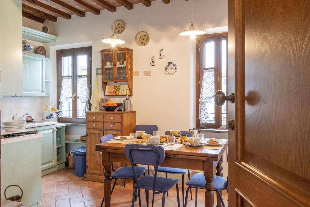 A kitchen or kitchenette at Italian Experience-Il Borgo Apartment