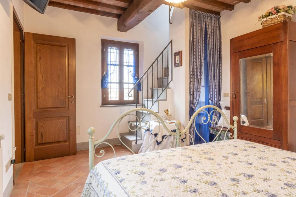 A bed or beds in a room at Italian Experience-Il Borgo Apartment