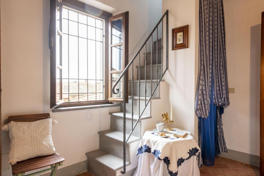 A seating area at Italian Experience-Il Borgo Apartment