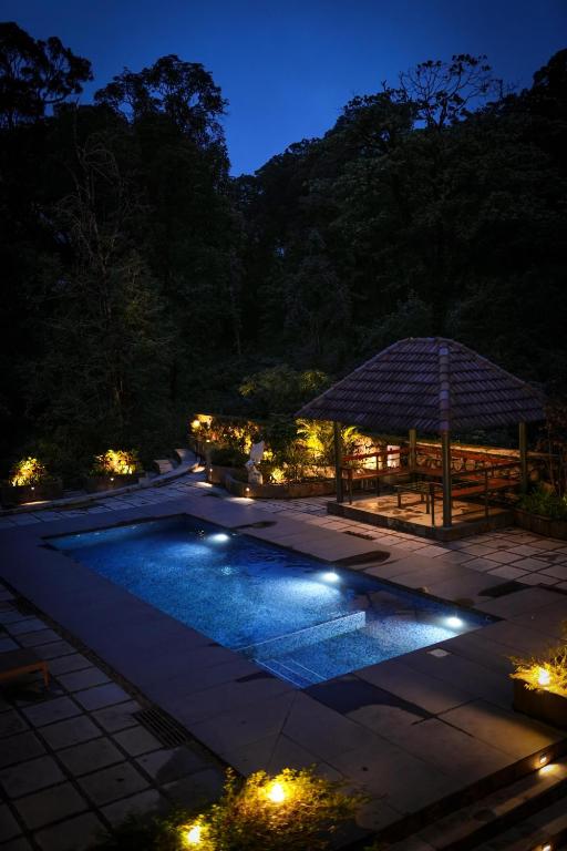 Bazén v ubytování Elixir Woods Luxury Resort And Spa, Munnar nebo v jeho okolí