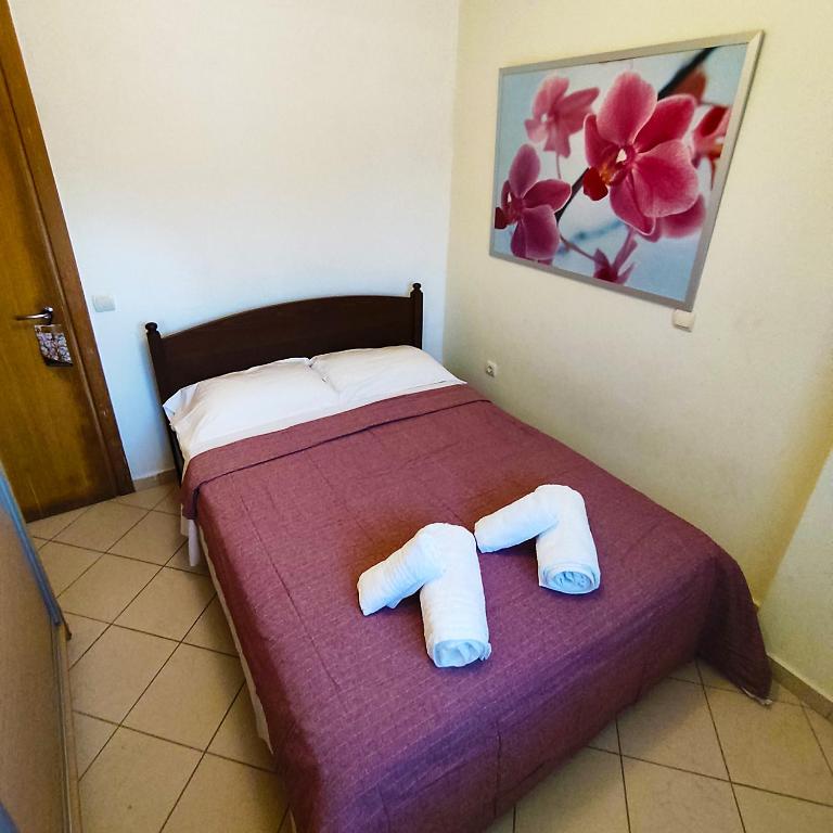 Postel nebo postele na pokoji v ubytování Estella Siviri Apartment