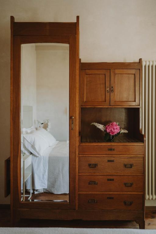Postel nebo postele na pokoji v ubytování Corte Cavolo