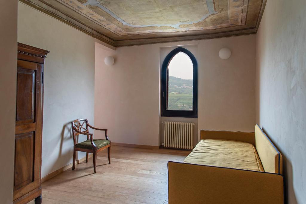 Postel nebo postele na pokoji v ubytování Corte Cavolo