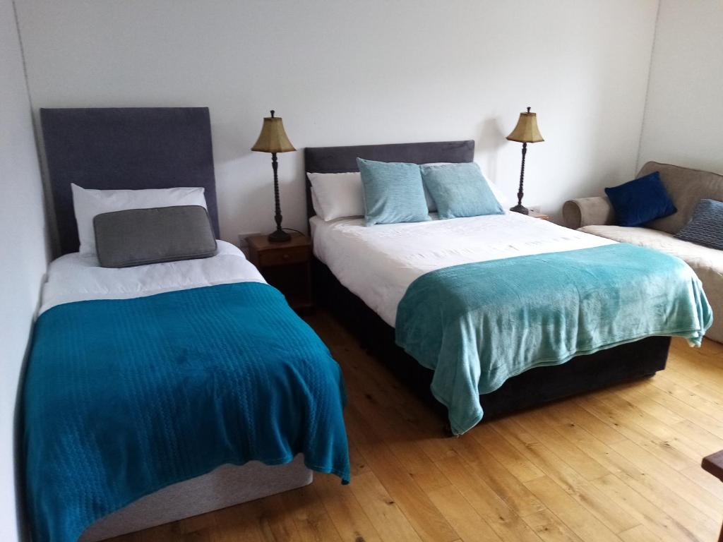 Postel nebo postele na pokoji v ubytování Farnaught House