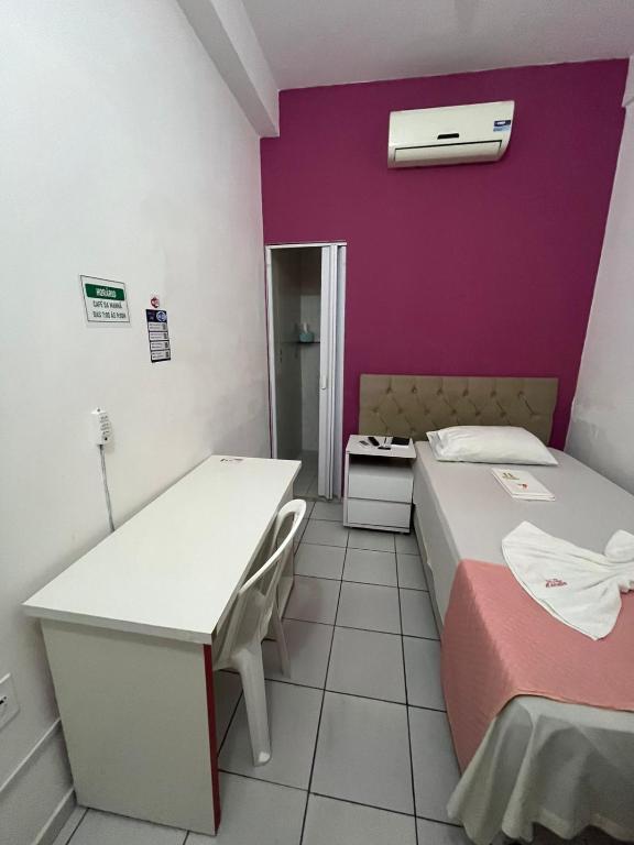 Postel nebo postele na pokoji v ubytování Pousada Executiva