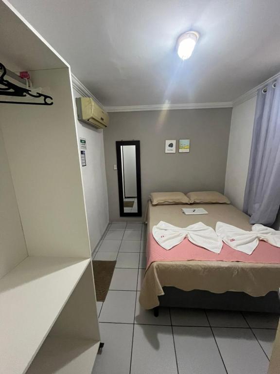 Postel nebo postele na pokoji v ubytování Pousada Executiva