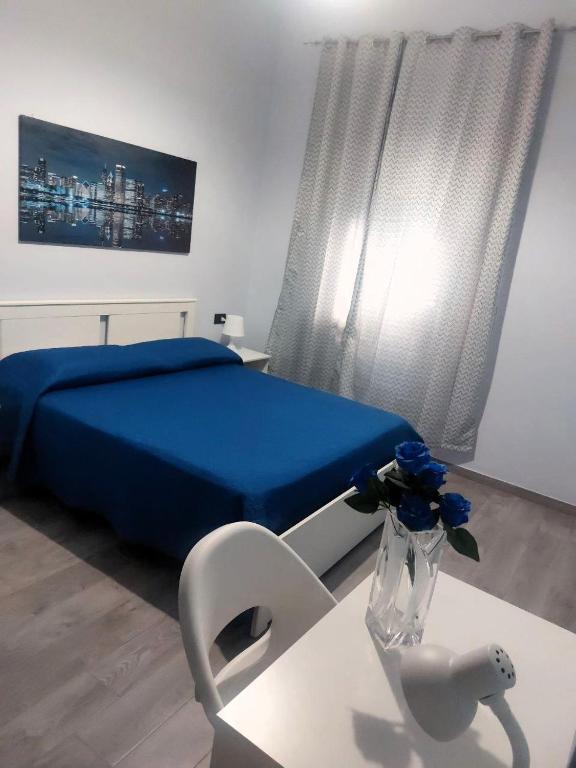 Postel nebo postele na pokoji v ubytování B&B Metropolitan RC