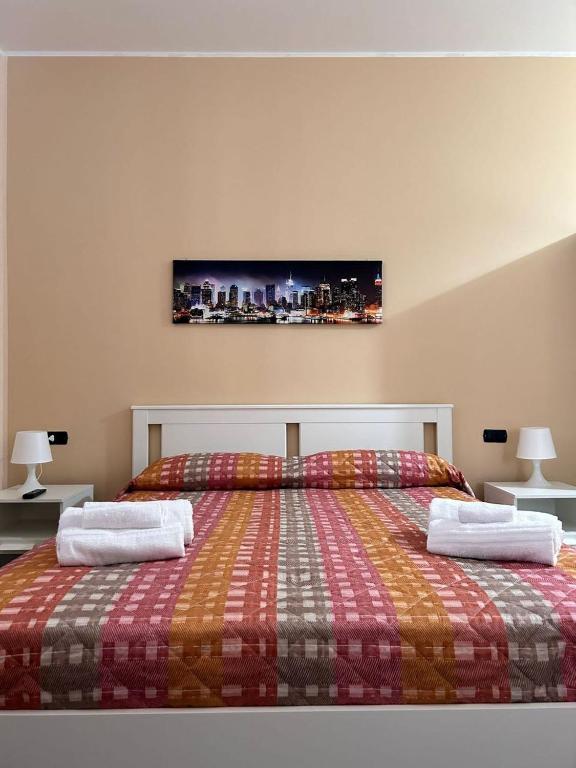 Postel nebo postele na pokoji v ubytování B&B Metropolitan RC