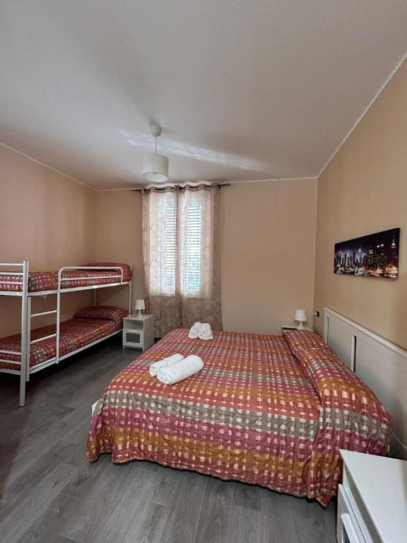 Postel nebo postele na pokoji v ubytování B&B Metropolitan RC