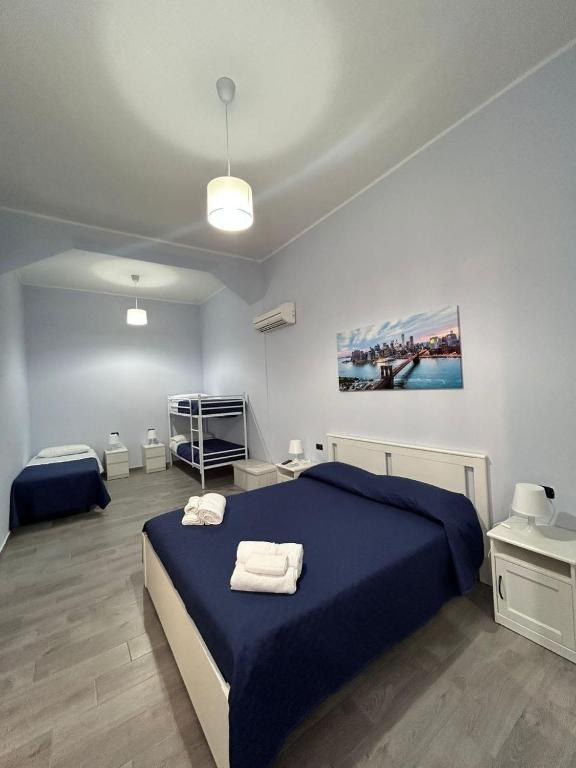 Postel nebo postele na pokoji v ubytování B&B Metropolitan RC