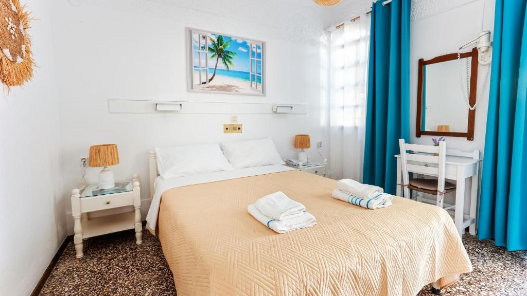 Postel nebo postele na pokoji v ubytování Melissani hotel