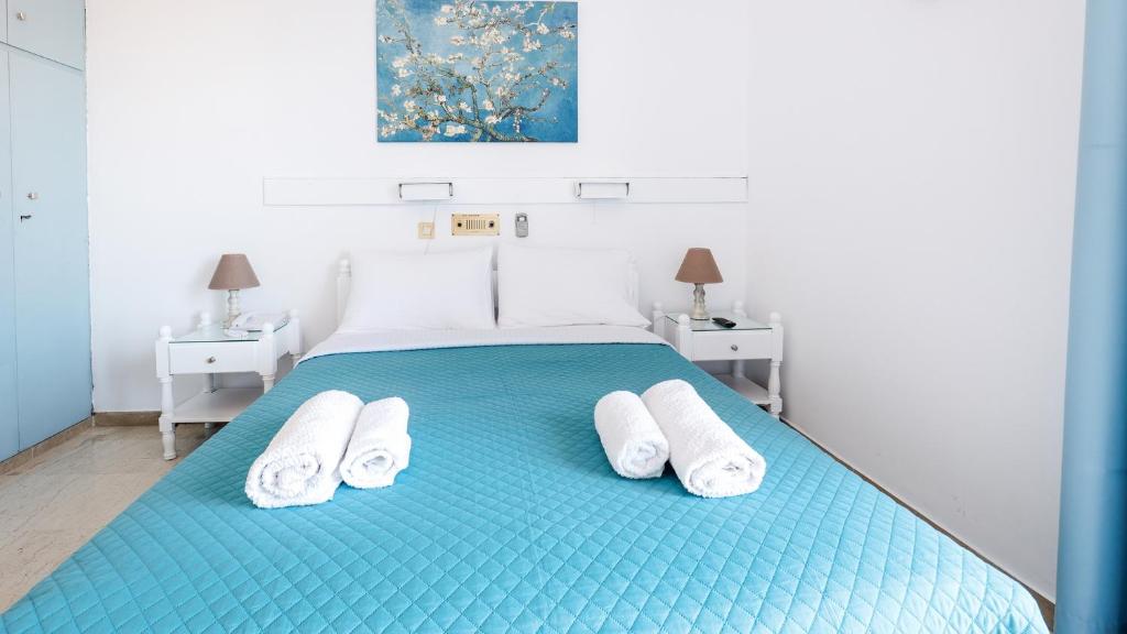 Postel nebo postele na pokoji v ubytování Melissani hotel