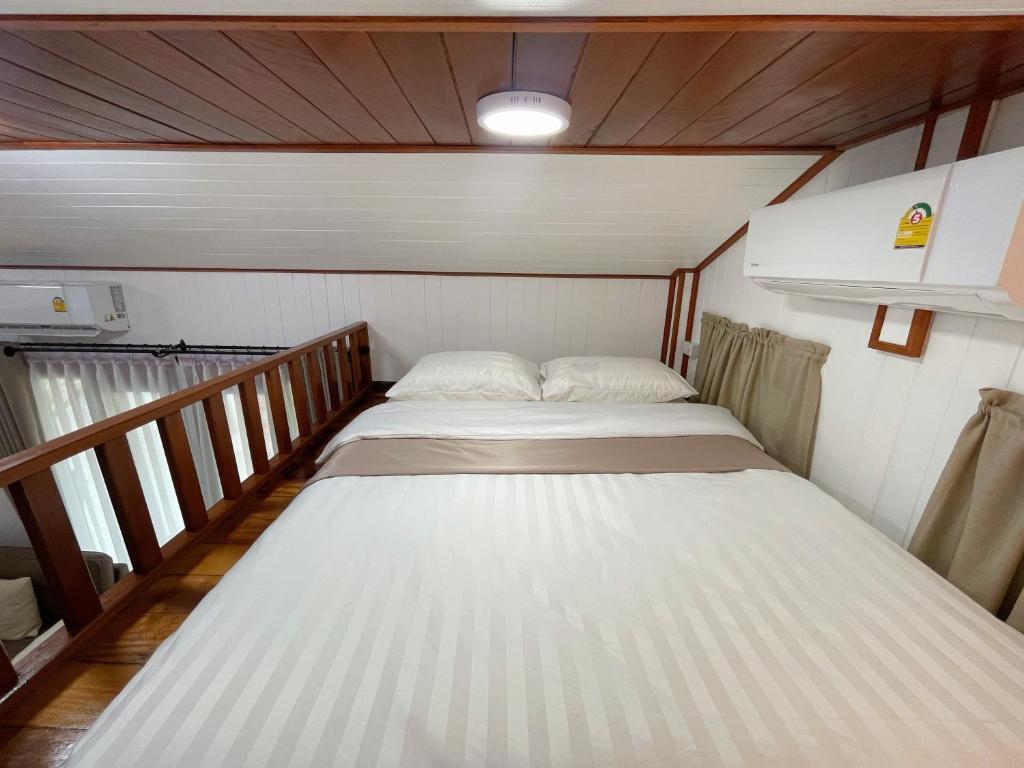 Postel nebo postele na pokoji v ubytování Anna River Home A2