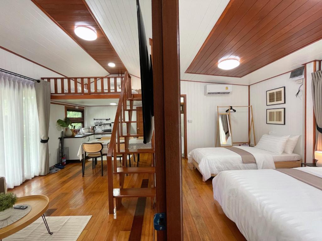 Postel nebo postele na pokoji v ubytování Anna River Home A2