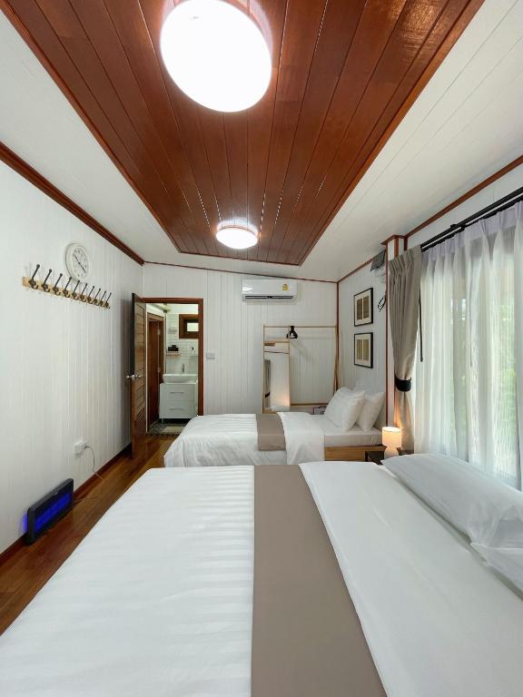 Postel nebo postele na pokoji v ubytování Anna River Home A2