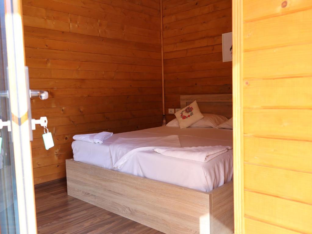 Postel nebo postele na pokoji v ubytování MIK Hotel Valbona