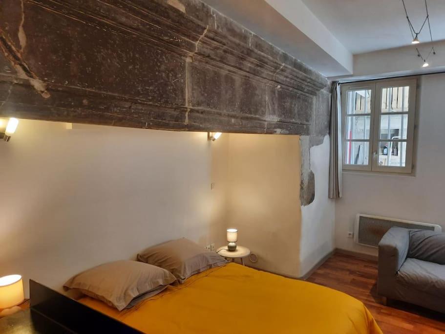 Postel nebo postele na pokoji v ubytování Studio avec terrasse