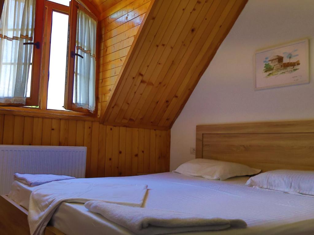 Postel nebo postele na pokoji v ubytování MIK Hotel Valbona