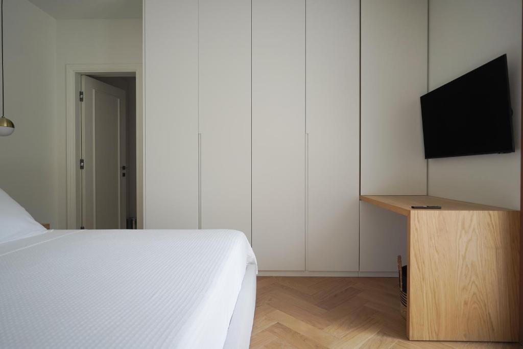 TV a/nebo společenská místnost v ubytování Plaka House - Boutique Apartments