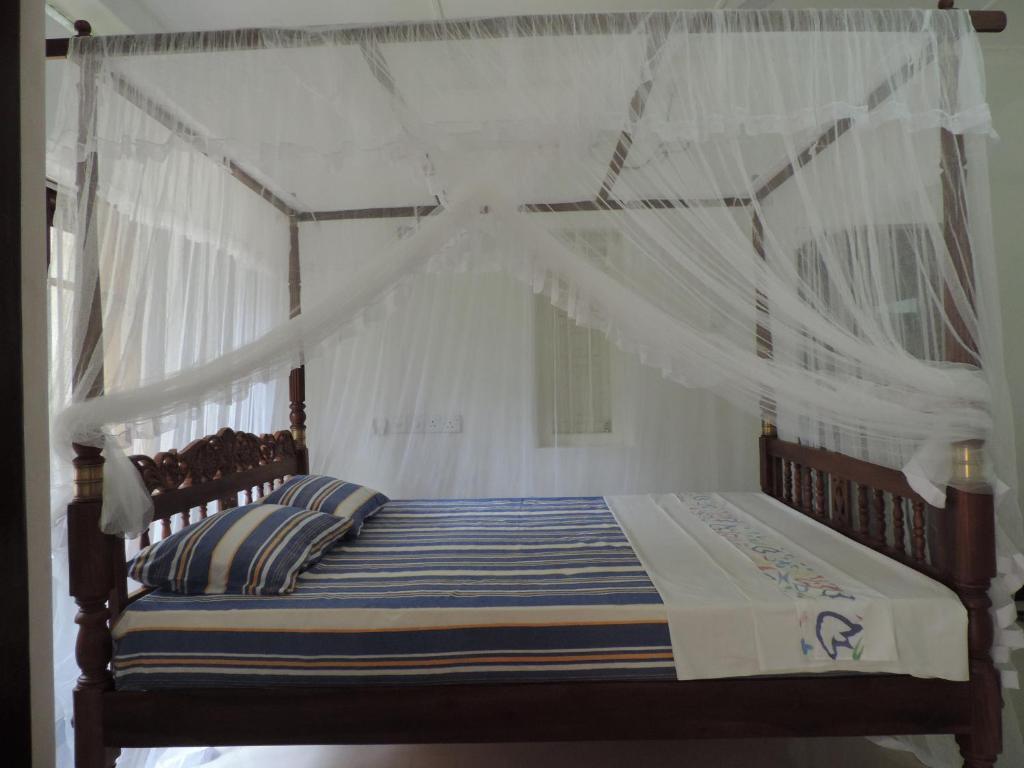 Postel nebo postele na pokoji v ubytování Sun Vivanta Resort