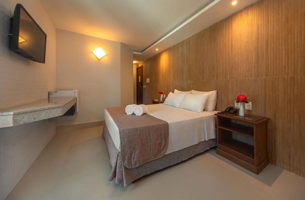 Postel nebo postele na pokoji v ubytování Quinta do Sol Lite Praia Hotel