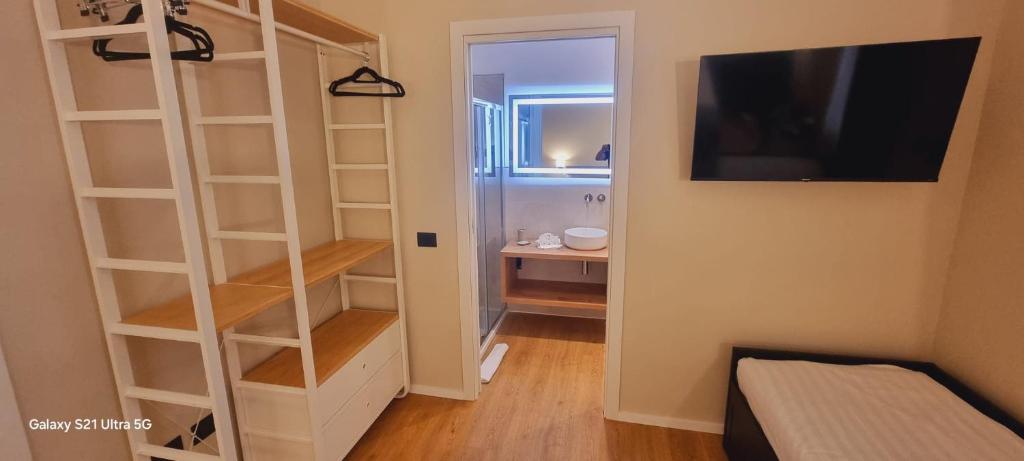 TV a/nebo společenská místnost v ubytování EVA LUXURY SUITE