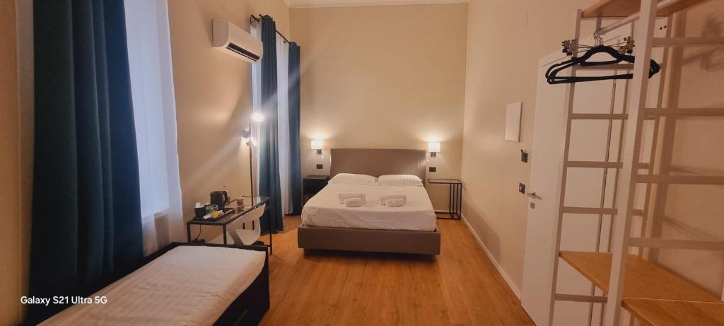 Postel nebo postele na pokoji v ubytování EVA LUXURY SUITE