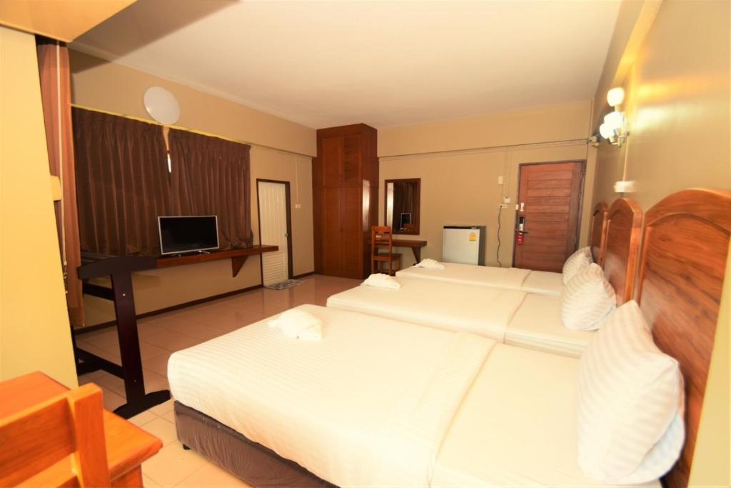 Postel nebo postele na pokoji v ubytování Best LD Hotel โรงแรมเบส แอลดี