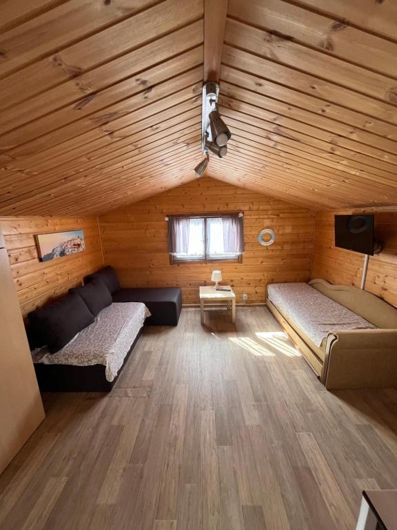 TV a/nebo společenská místnost v ubytování Ranczo u Korby