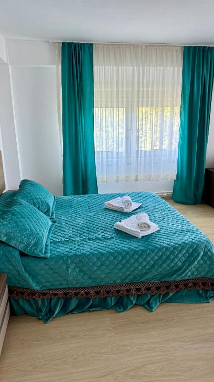 Postel nebo postele na pokoji v ubytování Hotel Falkor