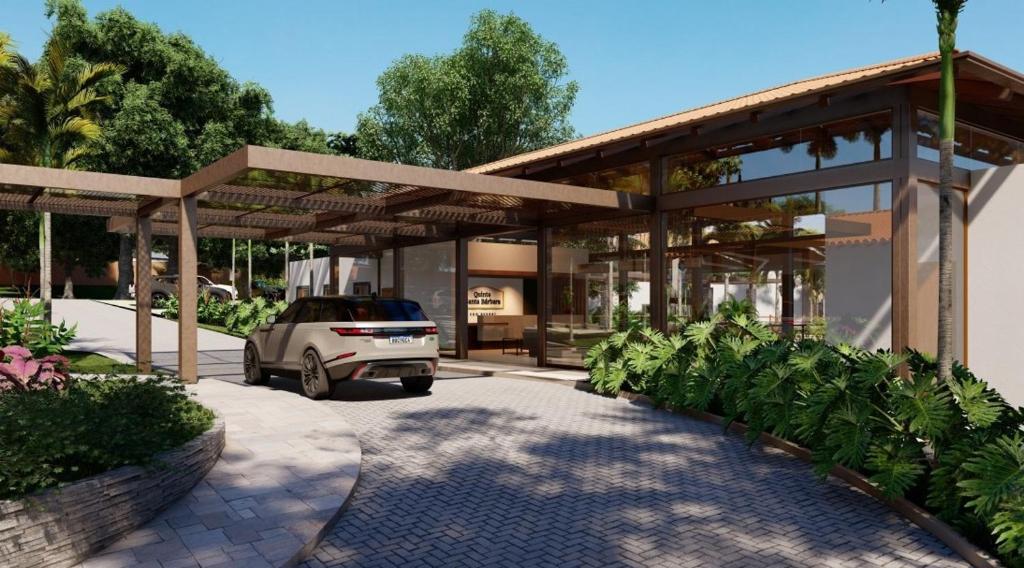 a car parked in front of a house at Quinta Santa Bárbara Eco Resort in Pirenópolis