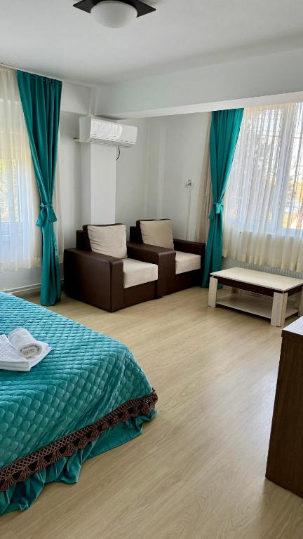 Postel nebo postele na pokoji v ubytování Hotel Falkor
