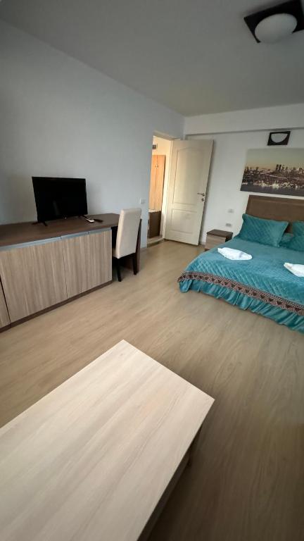 Postel nebo postele na pokoji v ubytování Hotel Falkor