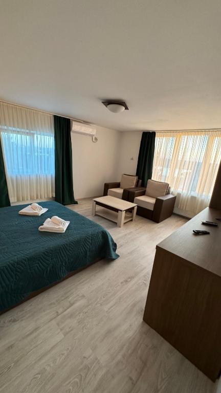 Postel nebo postele na pokoji v ubytování Hotel Falkor