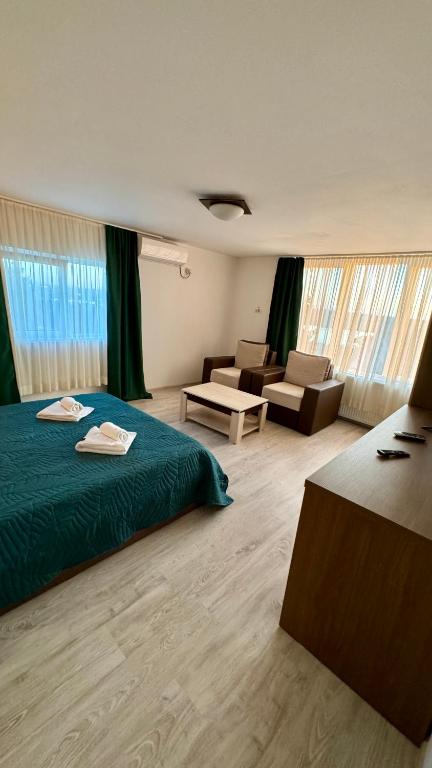 Postel nebo postele na pokoji v ubytování Hotel Falkor